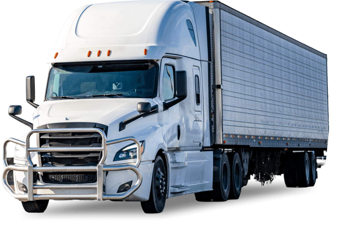 A white truck is driving down the road.